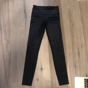 Two black pairs of leggings